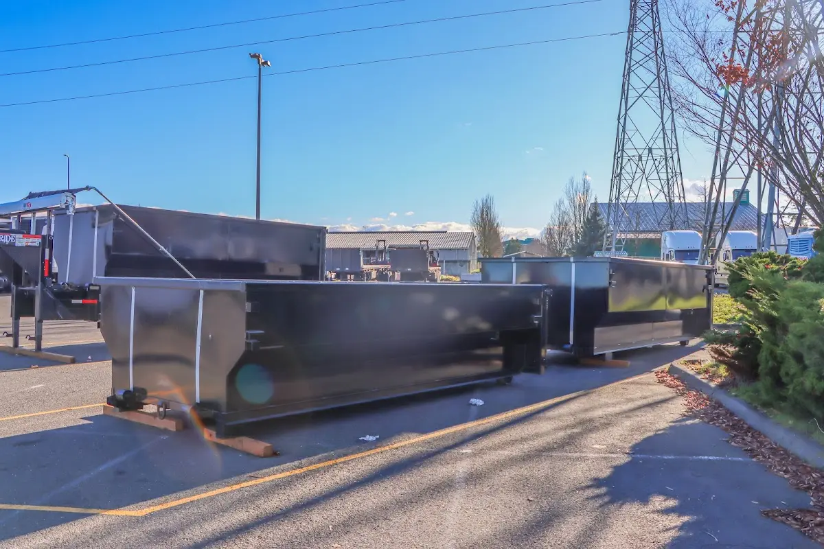 Roll-off dumpster ready for waste disposal at job site for 12 Yard Dumpster Rental in Holyoke